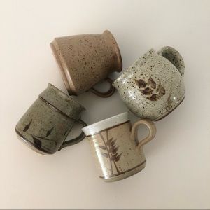 Set of 4 assorted artisanal pottery mugs